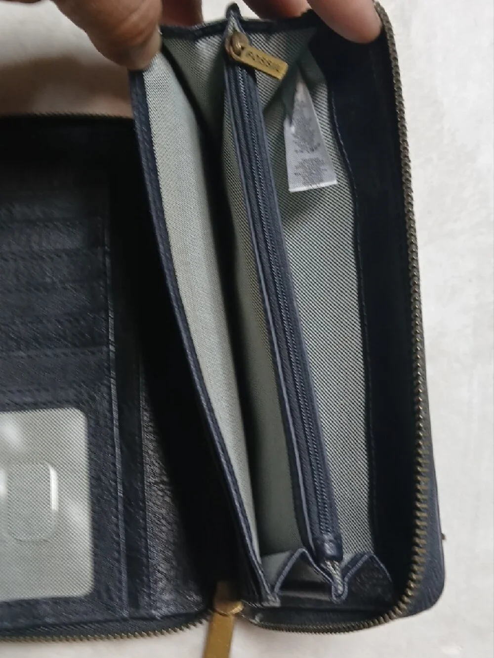Fossil Black Leather Zip-Around Wallet with Gold Accent
